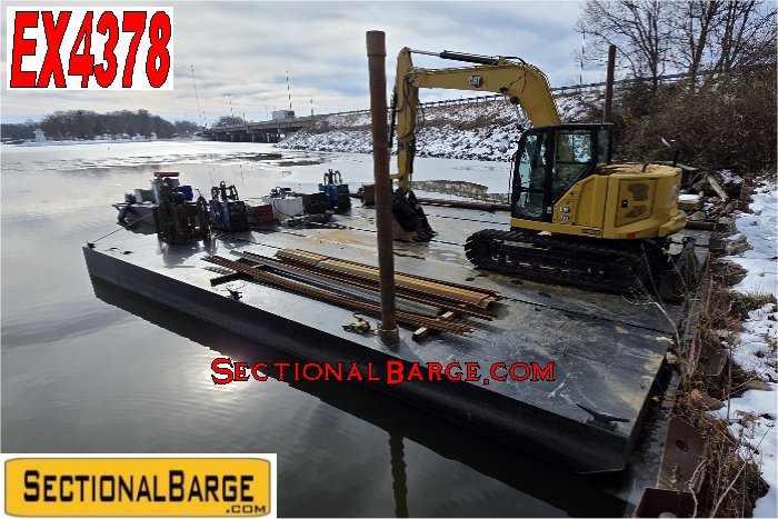 EX4378 - CAT 310 EXCAVATOR BARGE & WORK BOAT PKG.